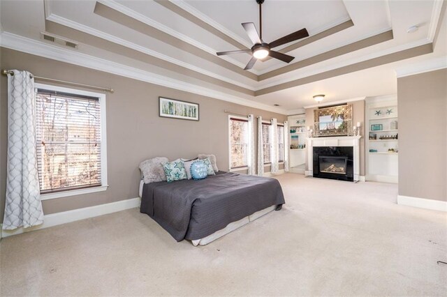 1105 River Laurel Dr, Suwanee, GA 30024 - bedroom featuring a tray ceiling, crown molding, carpet, and baseboards