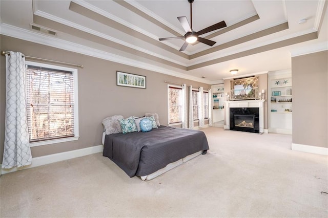1105 River Laurel Dr, Suwanee, GA 30024 - bedroom featuring a tray ceiling, crown molding, carpet, and baseboards