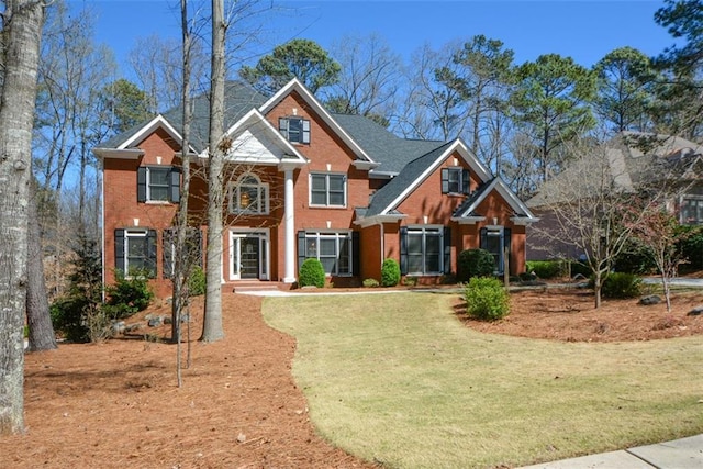 1105 River Laurel Dr, Suwanee, GA 30024 - greek revival inspired property featuring brick siding and a front yard