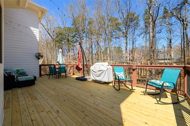 1105 River Laurel Dr, Suwanee, GA 30024 - wooden deck with outdoor dining space and grilling area