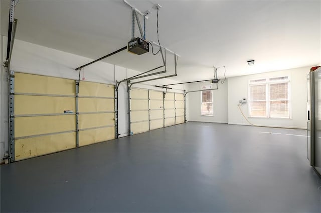 1105 River Laurel Dr, Suwanee, GA 30024 - garage featuring a garage door opener