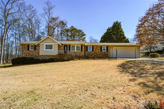 ranch-style home featuring brick siding, an attached garage, and driveway