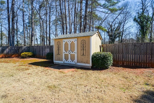 view of shed featuring a fenced backyard