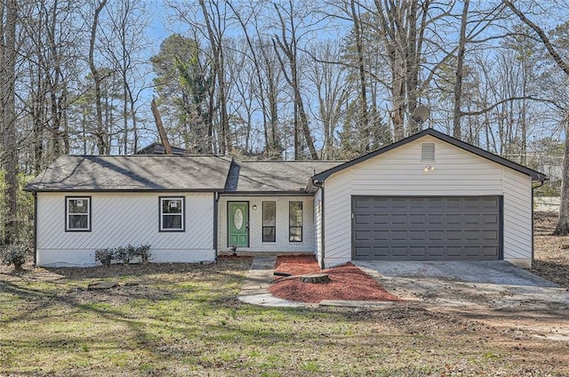 ranch-style home with driveway, a porch, and an attached garage