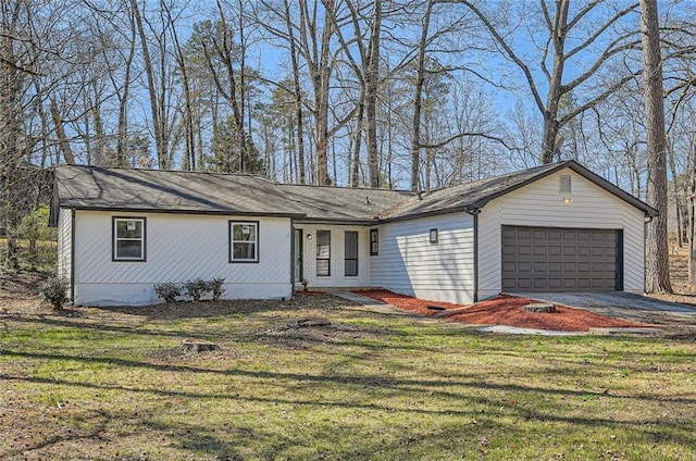 ranch-style home featuring driveway, a front lawn, an attached garage, and brick siding