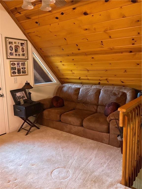 unfurnished living room with wooden ceiling, carpet, and lofted ceiling