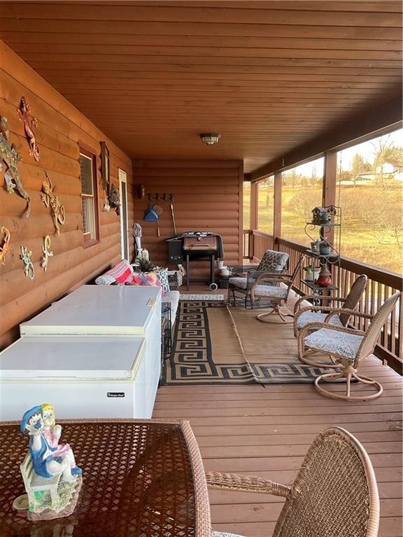 deck with covered porch