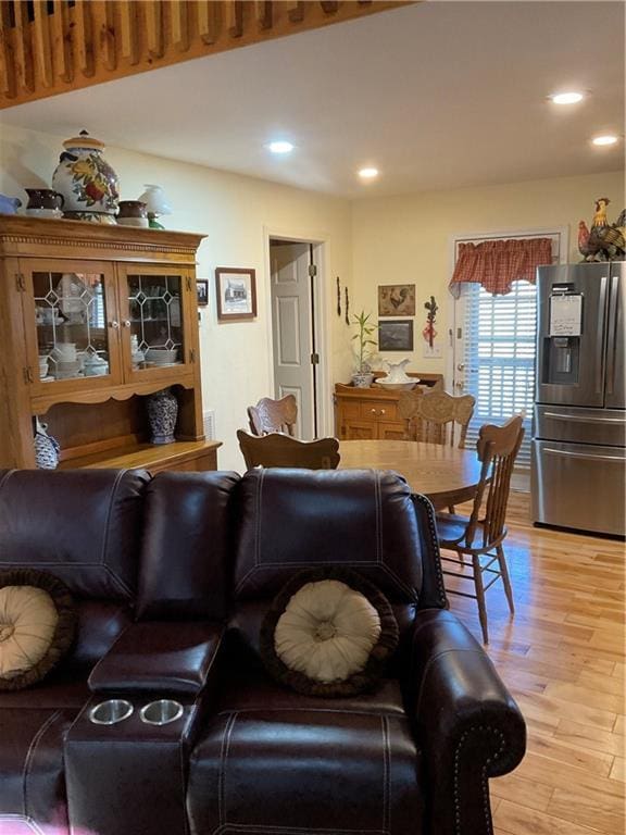 living room featuring recessed lighting and light wood-style flooring