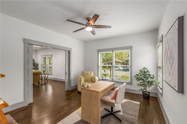 office featuring baseboards, wood finished floors, and a ceiling fan