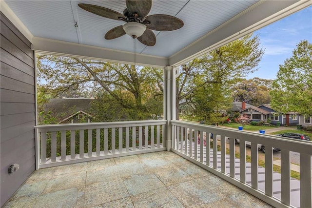 balcony featuring a ceiling fan