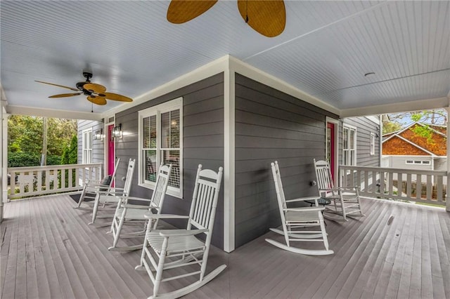 deck with a porch and a ceiling fan