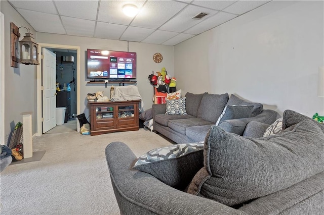 carpeted living room featuring a paneled ceiling and visible vents