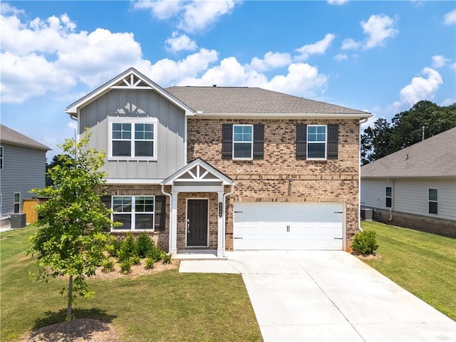 3660 Cattle Field Xing, Loganville, GA 30052 - craftsman inspired home with board and batten siding, an attached garage, concrete driveway, a front yard, and brick siding