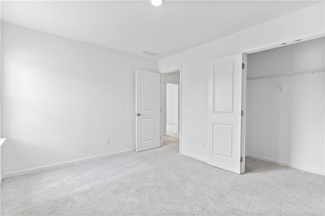 3660 Cattle Field Xing, Loganville, GA 30052 - unfurnished bedroom featuring carpet and a closet