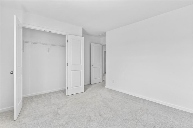 3660 Cattle Field Xing, Loganville, GA 30052 - unfurnished bedroom featuring carpet floors and a closet