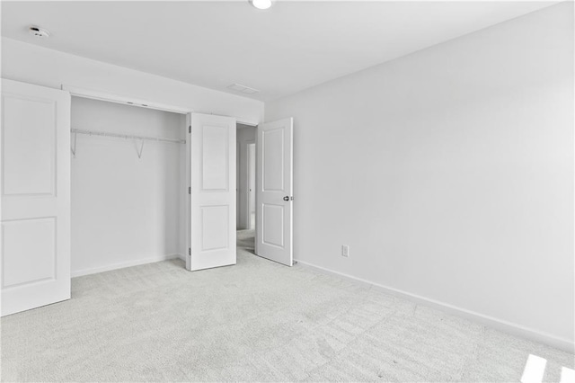 3660 Cattle Field Xing, Loganville, GA 30052 - unfurnished bedroom with light carpet and a closet
