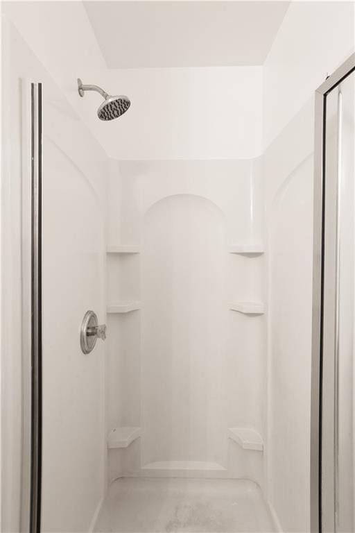 bathroom featuring a stall shower