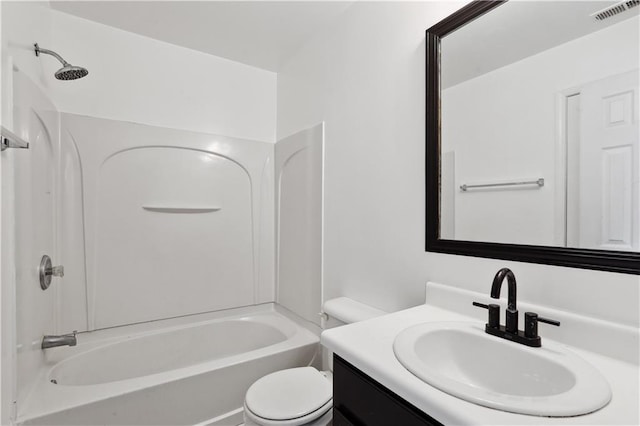 full bath featuring toilet, shower / bathtub combination, and vanity