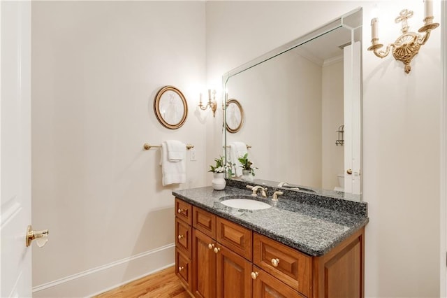 1655 Arrowhead Trl NE, Atlanta, GA 30345 - bathroom featuring vanity, wood finished floors, and baseboards