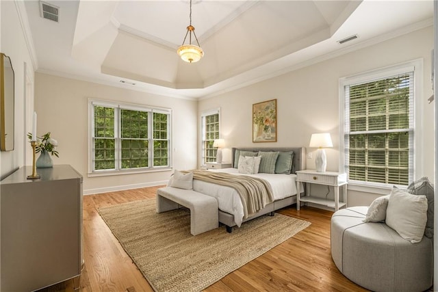 1655 Arrowhead Trl NE, Atlanta, GA 30345 - bedroom with a tray ceiling, crown molding, and wood finished floors