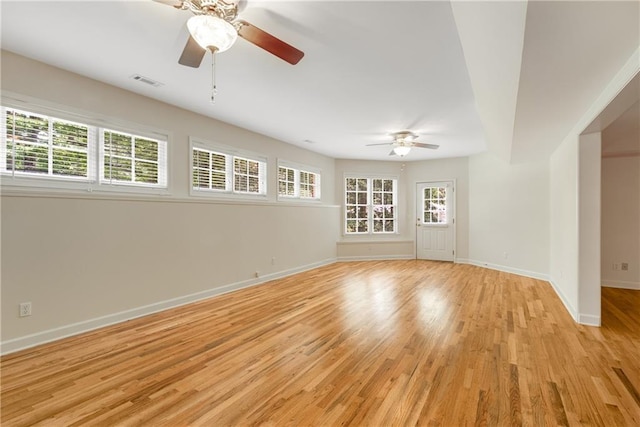 1655 Arrowhead Trl NE, Atlanta, GA 30345 - empty room featuring ceiling fan, light wood-style flooring, plenty of natural light, and baseboards