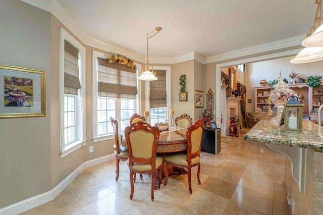 dining space with ornamental molding