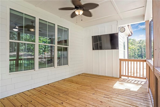 wooden deck with ceiling fan