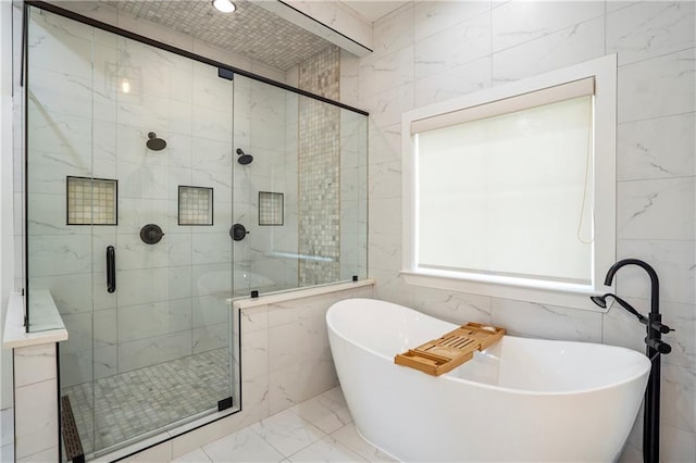 bathroom with tile walls and plus walk in shower