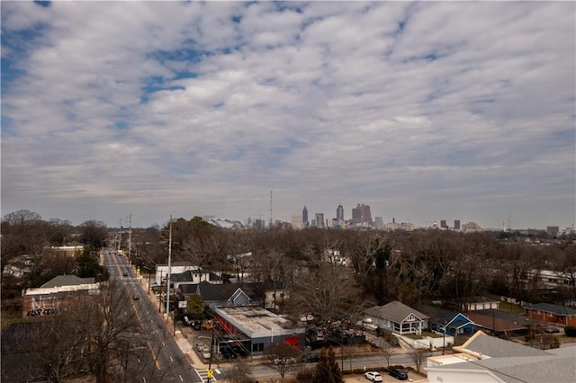 drone / aerial view featuring a city view