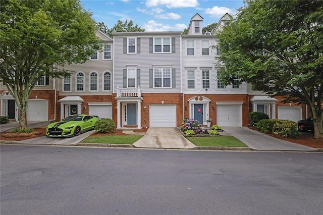 3443 Lathenview Ct, Alpharetta, GA 30004 - view of property with driveway, brick siding, and an attached garage