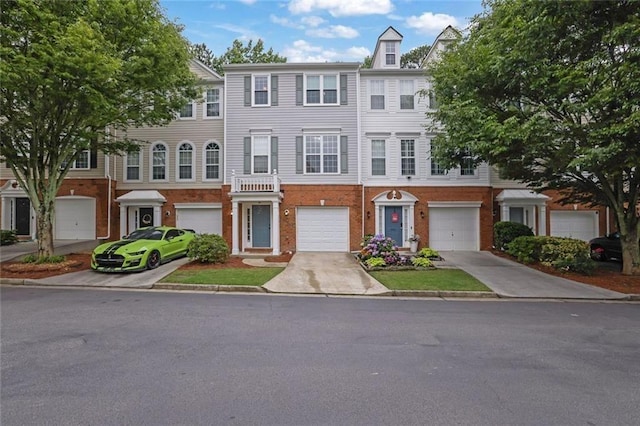 3443 Lathenview Ct, Alpharetta, GA 30004 - view of property featuring brick siding and driveway