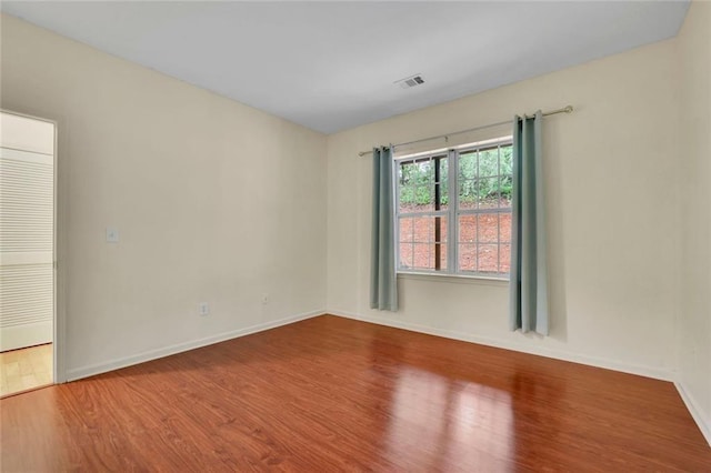 3443 Lathenview Ct, Alpharetta, GA 30004 - empty room featuring wood finished floors and baseboards