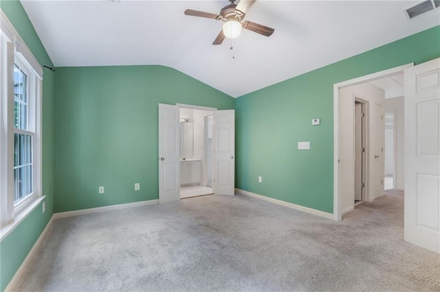3443 Lathenview Ct, Alpharetta, GA 30004 - unfurnished bedroom featuring lofted ceiling, multiple windows, and carpet flooring