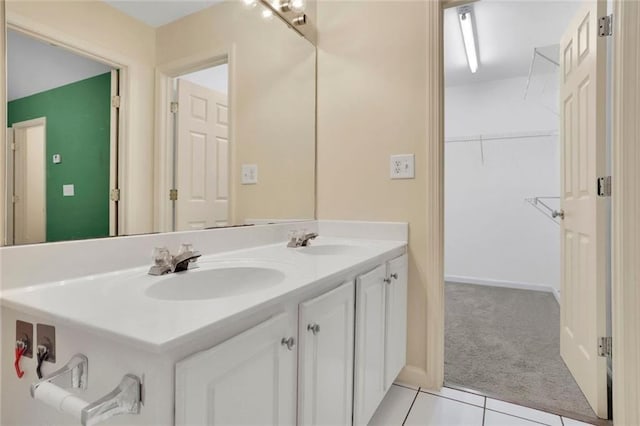 3443 Lathenview Ct, Alpharetta, GA 30004 - bathroom with double vanity, tile patterned floors, and a walk in closet