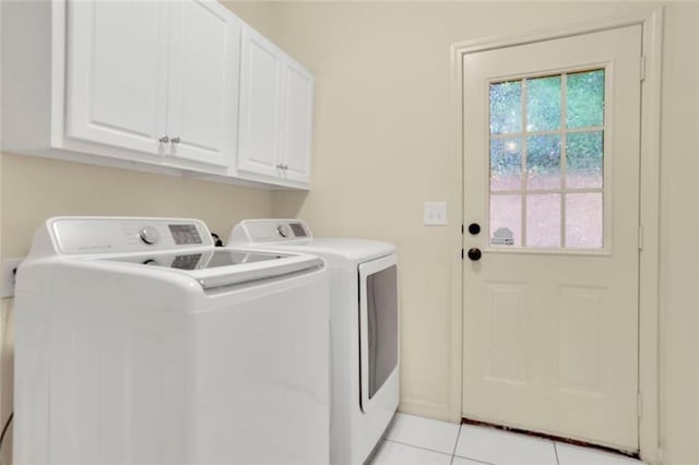 3443 Lathenview Ct, Alpharetta, GA 30004 - laundry area with washer and clothes dryer, cabinet space, and light tile patterned flooring