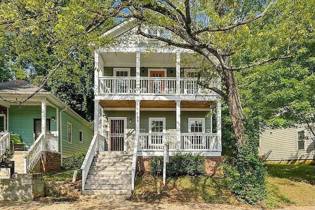 737 Cooper St SW, Atlanta, GA 30315 - view of front of house with a porch, a balcony, and stairs