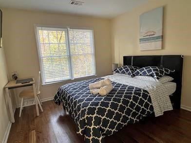 737 Cooper St SW, Atlanta, GA 30315 - bedroom with baseboards and wood finished floors