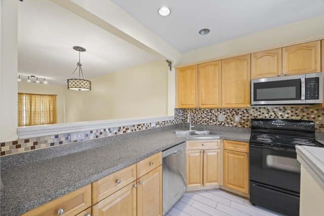 kitchen with a sink, appliances with stainless steel finishes, backsplash, and light brown cabinetry