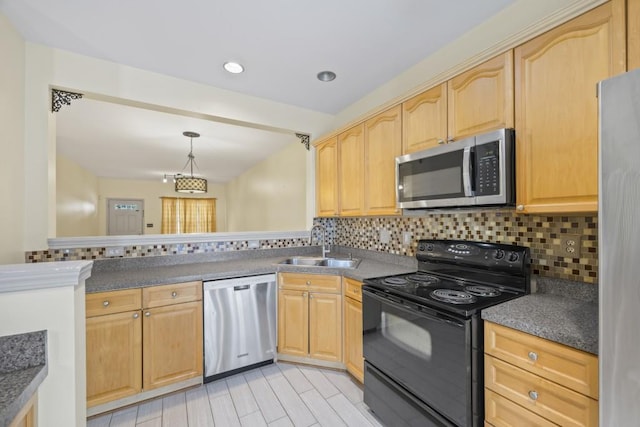 kitchen with backsplash, dark countertops, a sink, light brown cabinets, and stainless steel appliances