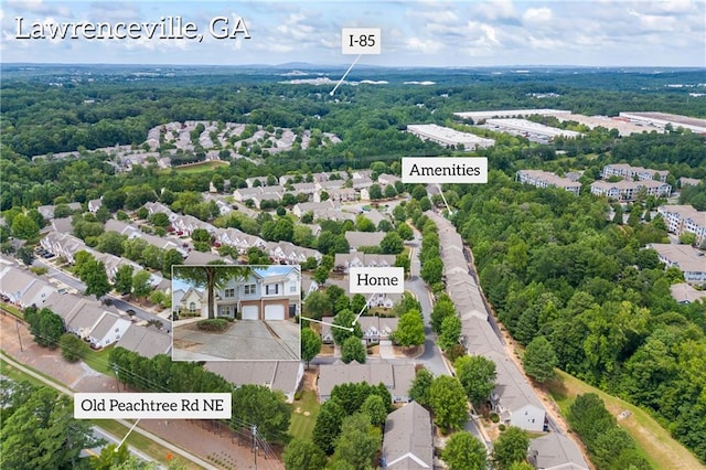 birds eye view of property with a residential view