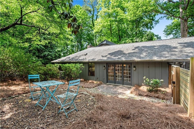 rear view of property with french doors