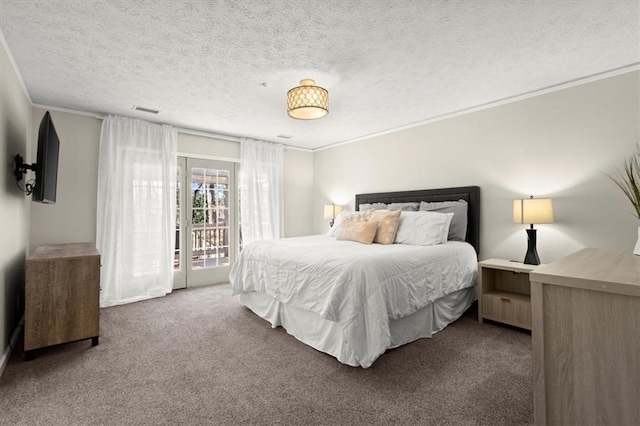 bedroom with carpet flooring, a textured ceiling, and ornamental molding