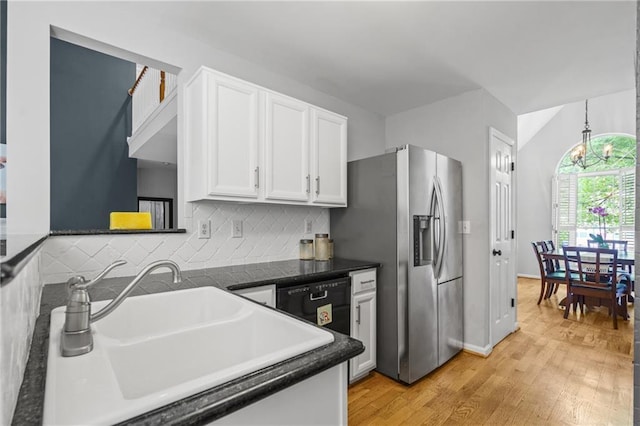 kitchen featuring a sink, stainless steel fridge with ice dispenser, white cabinets, light wood-type flooring, and decorative backsplash