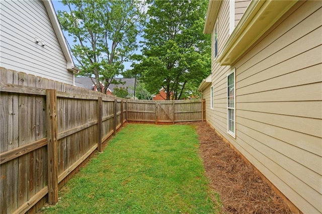 view of yard featuring a fenced backyard
