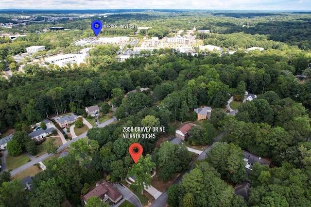 bird's eye view featuring a view of trees