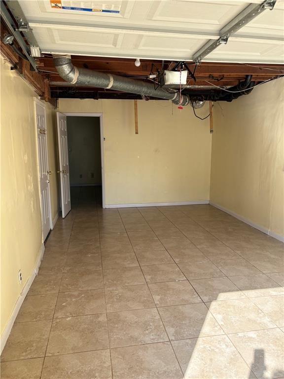 801 Needle Rock Dr, Stone Mountain, GA 30083 - garage with baseboards