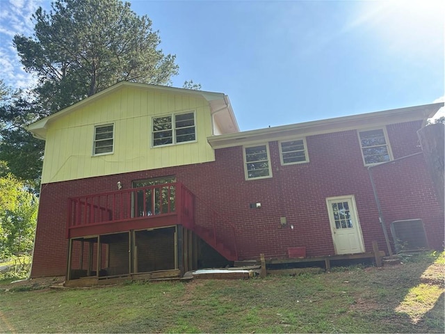 801 Needle Rock Dr, Stone Mountain, GA 30083 - back of house featuring stairs, brick siding, and a lawn