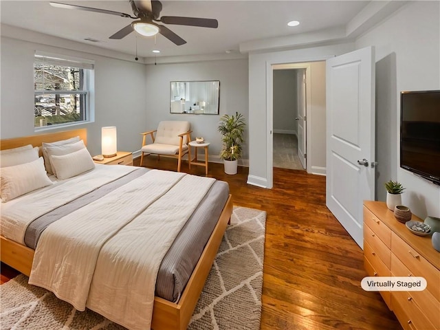 bedroom with visible vents, baseboards, ceiling fan, wood finished floors, and recessed lighting