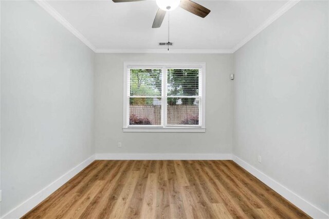 1283 Mercer, East Point, GA 30344 - empty room with ornamental molding, wood finished floors, and ceiling fan