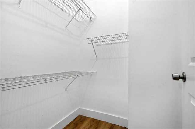 1283 Mercer, East Point, GA 30344 - spacious closet featuring dark wood finished floors